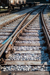 Fototapeta premium Weichen der Gleise von der Kandertalbahn im Bahnhof von Kandern im Markräflerland Chanderli
