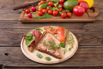 healthy sandwiches on wooden plate  on old wooden table