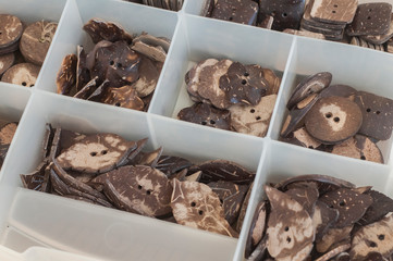Pile of coconut buttons closeup as button's background