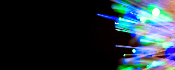 Bright multicolored luminous beams of light. Concept of of the modern technologies, big data, digital information