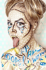 Bright pop art portrait of a fashionable stylish girl on colorful background. Halloween makeup