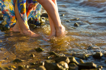 young woman and a man in the water
