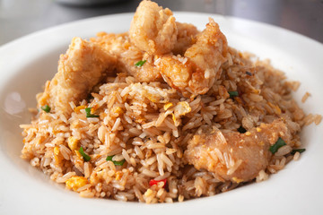 Peruvian seafood: chaufa de mariscos or rice with seafood Asian-style served on a white plate