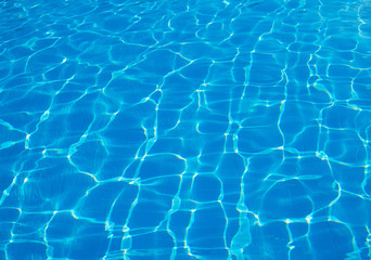 surface of blue swimming pool,background of water in swimming pool.
