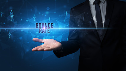 Elegant hand holding BOUNCE RATE inscription, social networking concept
