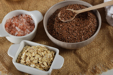 oat flakes, Himalayan salt and linseed in containers
