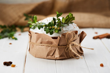 Glazed Easter cake on white wooden background, Traditional Kulich, Paska  ready for celebration