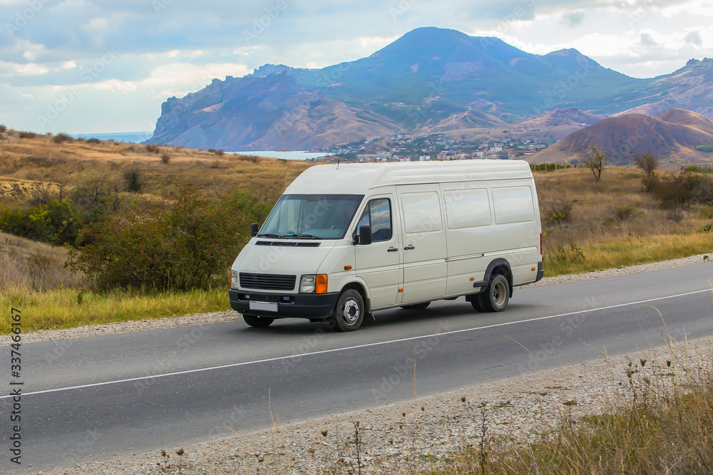 Poster minibus rides on the mountain highway