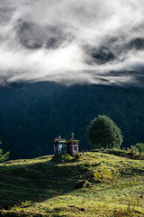 Fototapeta premium a beautiful mountain view with fog and clouds