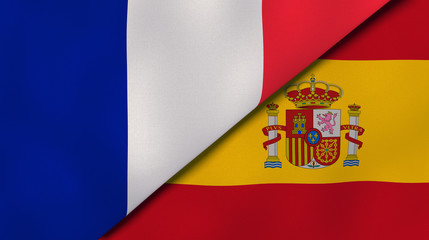 Fototapeta premium The flags of France and Spain. News, reportage, business background. 3d illustration
