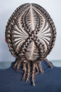 cornrows, plaits of the braids on the male head, underker