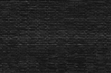 Black brick wall texture, dark background