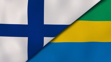 Obraz premium The flags of Finland and Gabon. News, reportage, business background. 3d illustration