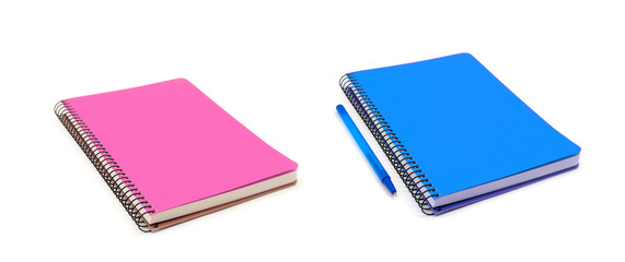 spiral blue notebook and pen isolated on white