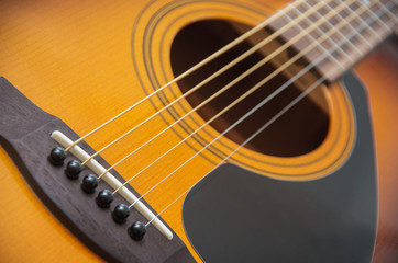 Fototapeta premium Acoustic guitar with very shallow depth of field