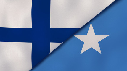 The flags of Finland and Somalia. News, reportage, business background. 3d illustration