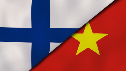 The flags of Finland and Vietnam. News, reportage, business background. 3d illustration