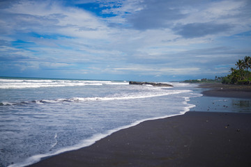 black beach and sea