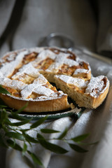 Preparation of Easter cake, also called Pastiera Napoli, typical homemade dessert, with eggs, flour, sugar and vanilla, wheat and colored sugared almonds
