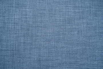 Fototapeta na wymiar Details of blue fabric textile texture background.