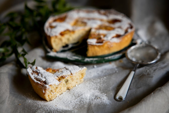Preparation of Easter cake, also called Pastiera Napoli, typical homemade dessert, with eggs, flour, sugar and vanilla, wheat and colored sugared almonds