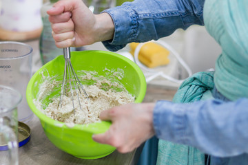 Pastry for homemade healthy muffins with raisins.