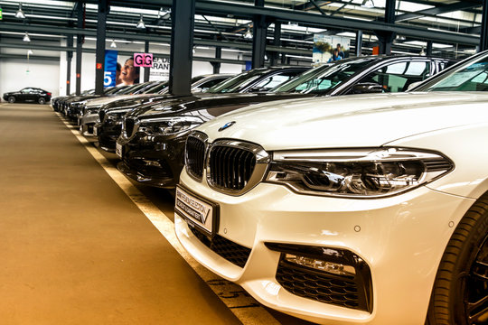 Nurnberg, Germany - BMW cars parked in front of car dealer. view of parked luxury cars in row.	