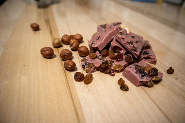 Pink Chocolate Chocolate with nuts, raisins and cranberries. Tasty.