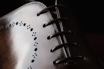 Close up of a new pair of brown leather dress shoes