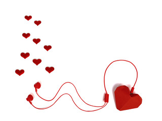 listen to the music of love. headphones and red paper hearts on a white isolated background. notes...