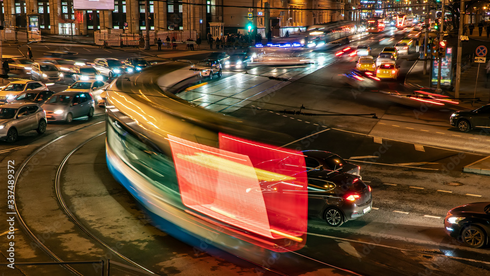 Wall mural extremely heavy traffic of trams and cars on the crossroad