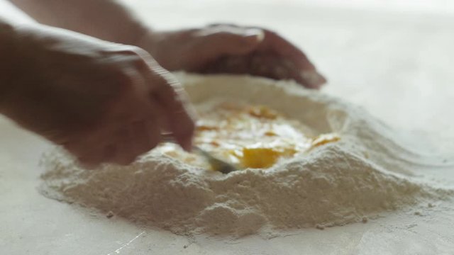 Tortellini, Beat the eggs in the flour. Prepare the pastry.