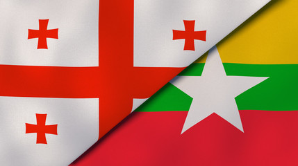 The flags of Georgia and Myanmar. News, reportage, business background. 3d illustration