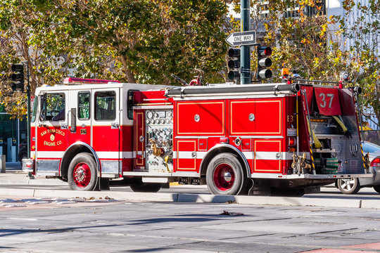 Nov 2, 2019 San Francisco / CA / USA - Firefighter engine driving on a street in Mission Bay District