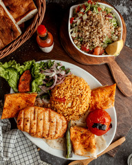 chicken cutlet with various food