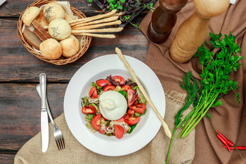 Italian young cheese - with juicy ripe tomatoes, olive oil, balsamic and salad