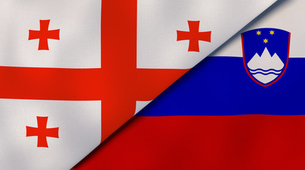 The flags of Georgia and Slovenia. News, reportage, business background. 3d illustration