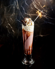 chocolate milkshake with cookies on top