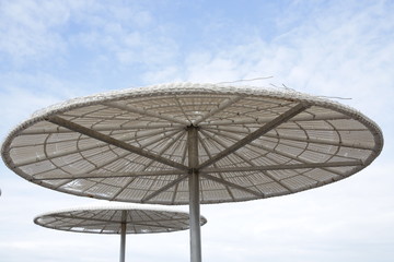 beach umbrella and blue sky with copy space for text