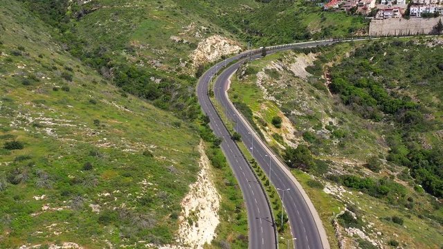 Corona Virus lockdown, Haifa Freud mountain road connecting the city lower west area to Central Carmel, with no traffic due to government guidelines, Aerial view.