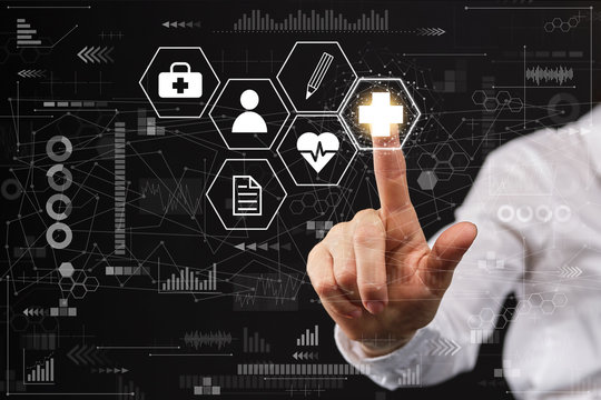 Healthcare insurance concept - man abstractly presses a finger.