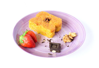 Carrot cake with nuts and cinnamon cooked at home during the coronavirus quarantine