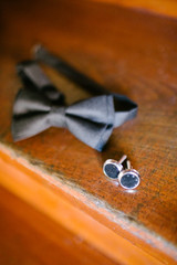 Bow tie and cufflinks. Preparations for the wedding day.