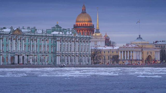 Timelapse of St Isaac's Cathedral with night lights and Neva river ice in St Petersburg, Russia