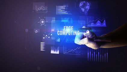 Hand touching EDGE COMPUTING inscription, new business technology concept