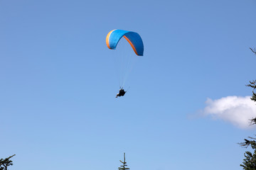 Vancouver, America - August 18, 2019: Paragliding tour at Grouse Mountain, Vancouver, America