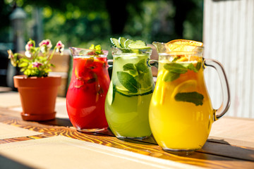 lemonades with lime lemon and raspberries with fruit