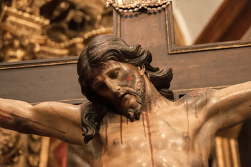 Christ statue crucified on the cross - obrazy, fototapety, plakaty