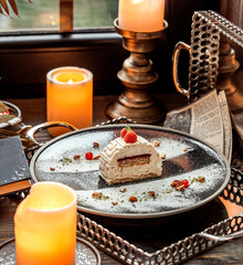 dessert slice topped with raspberries