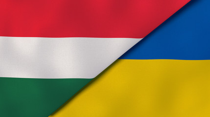 The flags of Hungary and Ukraine. News, reportage, business background. 3d illustration